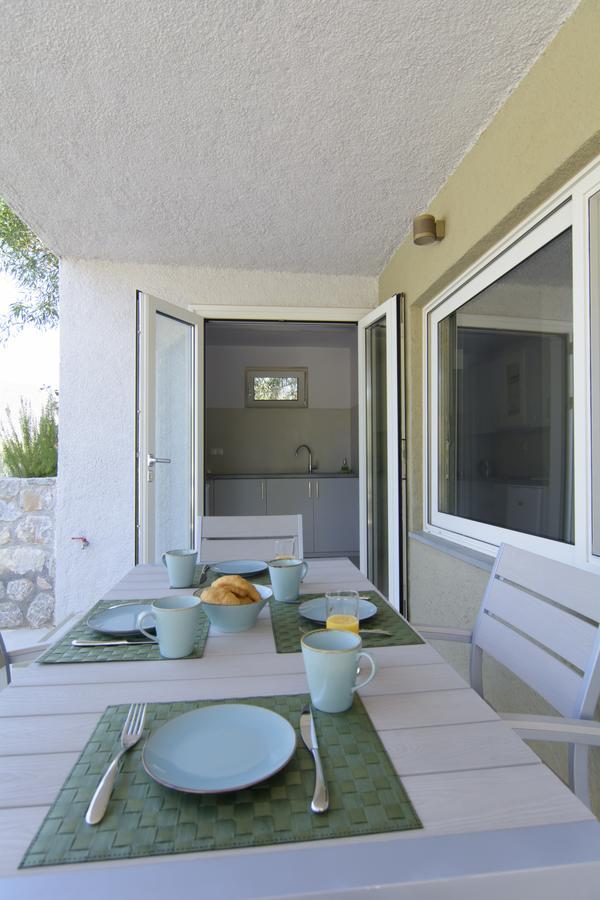 Aparthotel Lavender Cove à Kórfos Extérieur photo